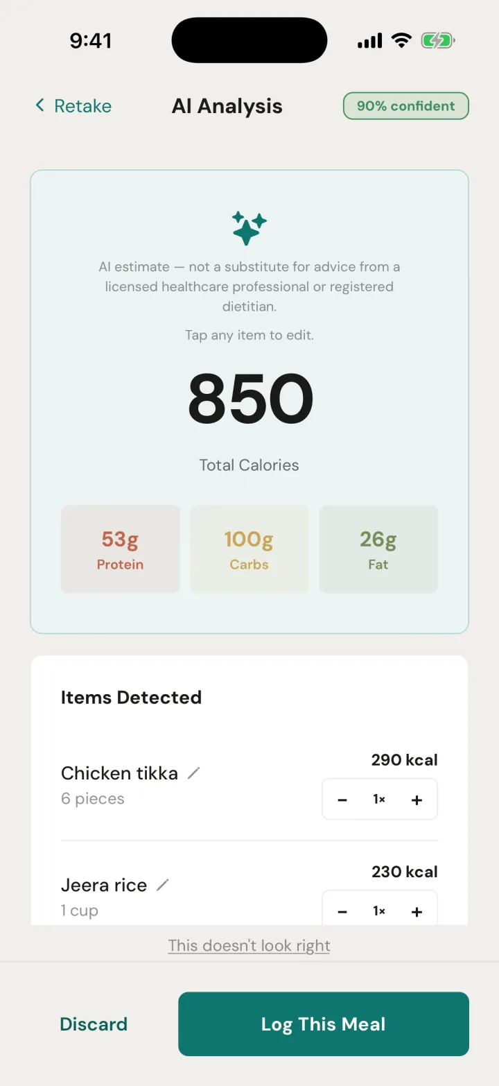 AI Analysis of a meal photo: 850 total calories, 53 g protein, 100 g carbs and 26 g fat, with detected items chicken tikka (6 pieces, 290 kcal) and jeera rice (1 cup, 230 kcal).